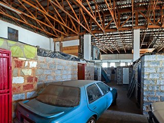 A view from inside one of the informally settled ware houses in Marlboro South.