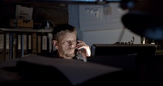 Still frame from the CCA film "What it takes to make a home" - Alexander Hagner working in his Studio