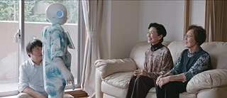 Sakurai with robot 'Pepper'