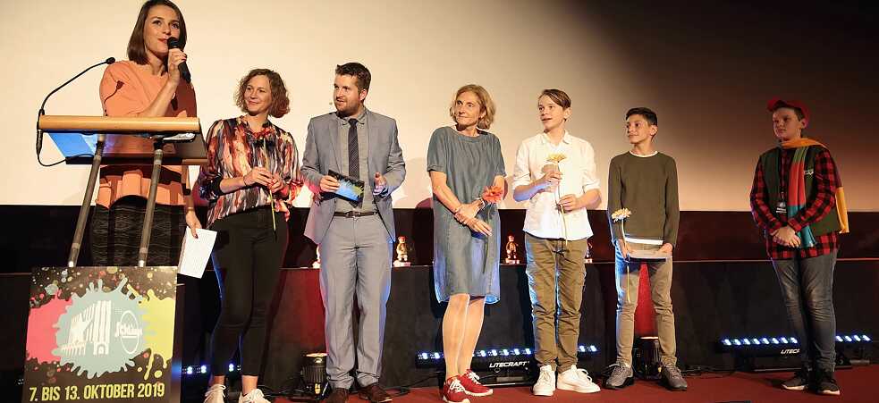 The team of Too Far Away during the award ceremony