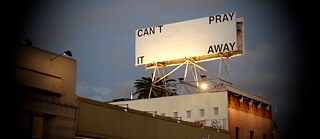 Billboard in Los Angeles with the message "can't pray it away"