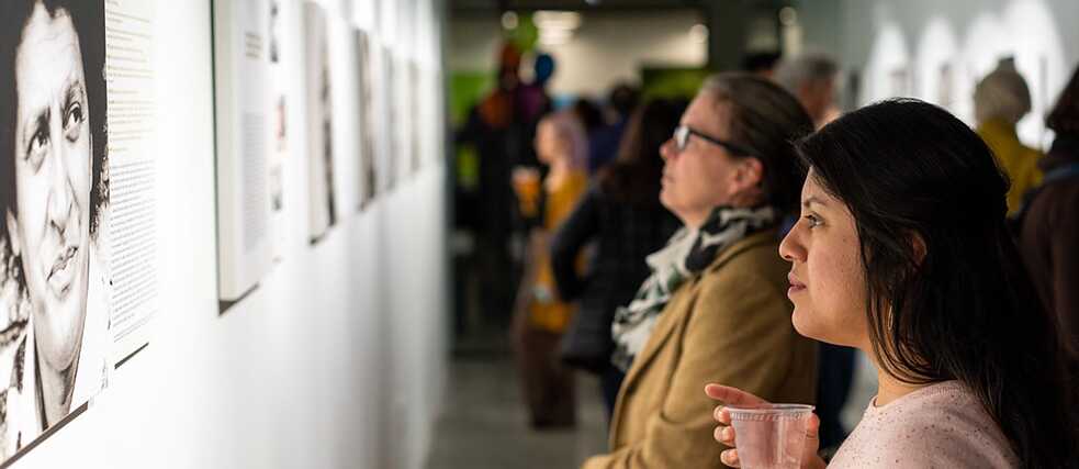 Visitors in Washington in the exhibition “Home Story Deutschland”  by the initiative Schwarze Menschen in Deutschland