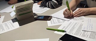 Participants in action in the seven-minute writing games