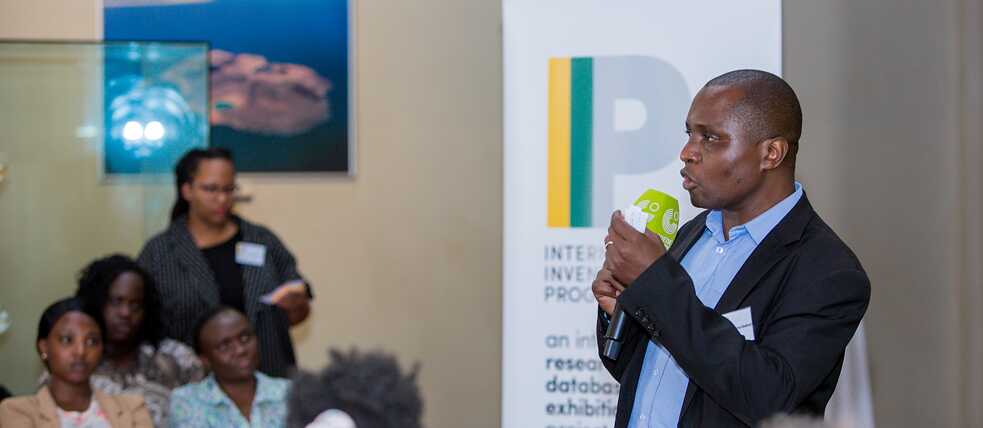 George Juma Ondeng' welcomes the public on behalf of the National Museums of Kenya to the launch of the exhibition project "Invisible Inventories".