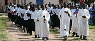 Sunday service of a Catholic congregation in the provincial capital Kuito, less than an hour by plane from Luanda