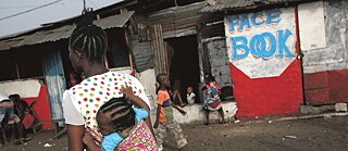 Internet café with a woman and a baby