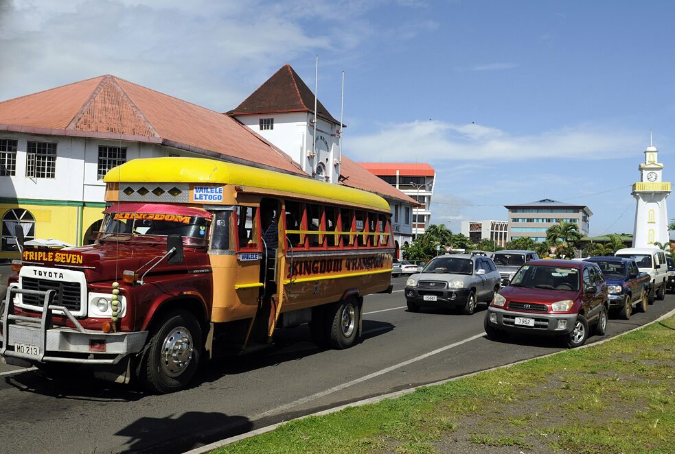 Latitude: Rush hour in the center of Apia, Samoa. In the background on the right is the Clock Tower. The Clock Tower is one of the landmarks of Apia and commemorates the Samoans who died on the side of the Allies in World War I. The island state of Samoa is located in the South Pacific south of the equator not far from the International Date Line, belongs to Polynesia and experienced a long colonial period under the rule of various countries (United Kingdom, German Empire, United States of America, New Zealand)