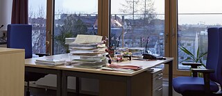 View of an empty office with two desks facing each other