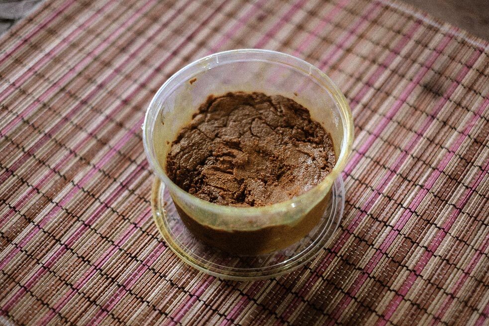 The Golden Paste after it has been cooked already. As the name implies, it can be referred to as “herbal medicine”, but it is not liquid, it looks more like toothpaste. To enjoy it, take one teaspoon or tablespoon and swallow it immediately, without thawing it first.  