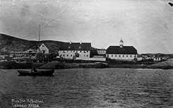 A historical photograph of the mission building