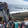 German travellers boarding an emergency repatriation flight in Peru