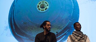 Filmemacher Fradique und Didi Cheeka in der Culturgest im September 2019 während eines Panels zu (De)kolonialen Filmarchiven