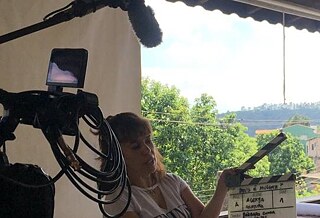 God is a woman camera