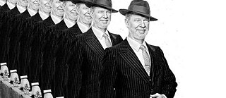 Man with hat and suitcase