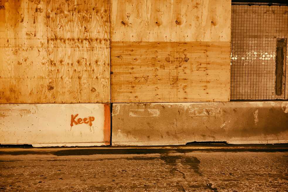 DC’s long 3rd Street Tunnel is in a constant state of disrepair. Drivers stuck in traffic were given a profound one-word poem to ponder when workers marked this concrete lane divider for saving.