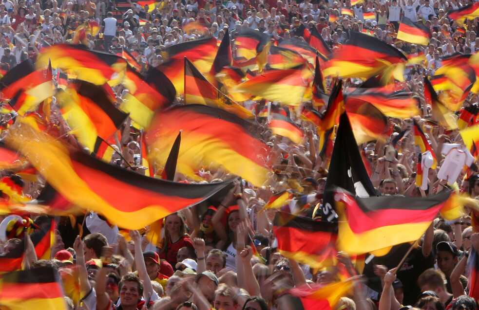 Racism – Football fans celebrating at a giant public screening during the 2006 World Cup in Germany.