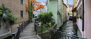 Augsburg‘s many canals provide renewable energy and the multiple small bridges add to the charm of the historic city centre. 