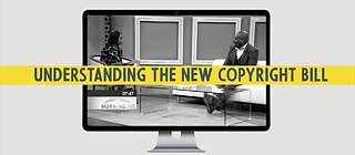 A screen shows an interviewer and and interviewee sitting opposite each other 