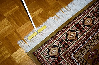 Comb for Rug Fringes- from the photo "Folded, Always a Mistake" essay by Christian Werner