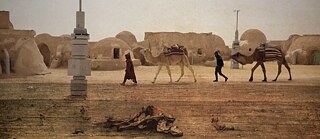 The painting “Le Sahara” by Gustave Guillaumet meets the abandoned “Star Wars” film set in Tunisia. 