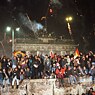 At the end of 1989, hundreds of thousands of East and West Germans celebrated New Year’s Eve on the Berlin Wall at the Brandenburg Gate.