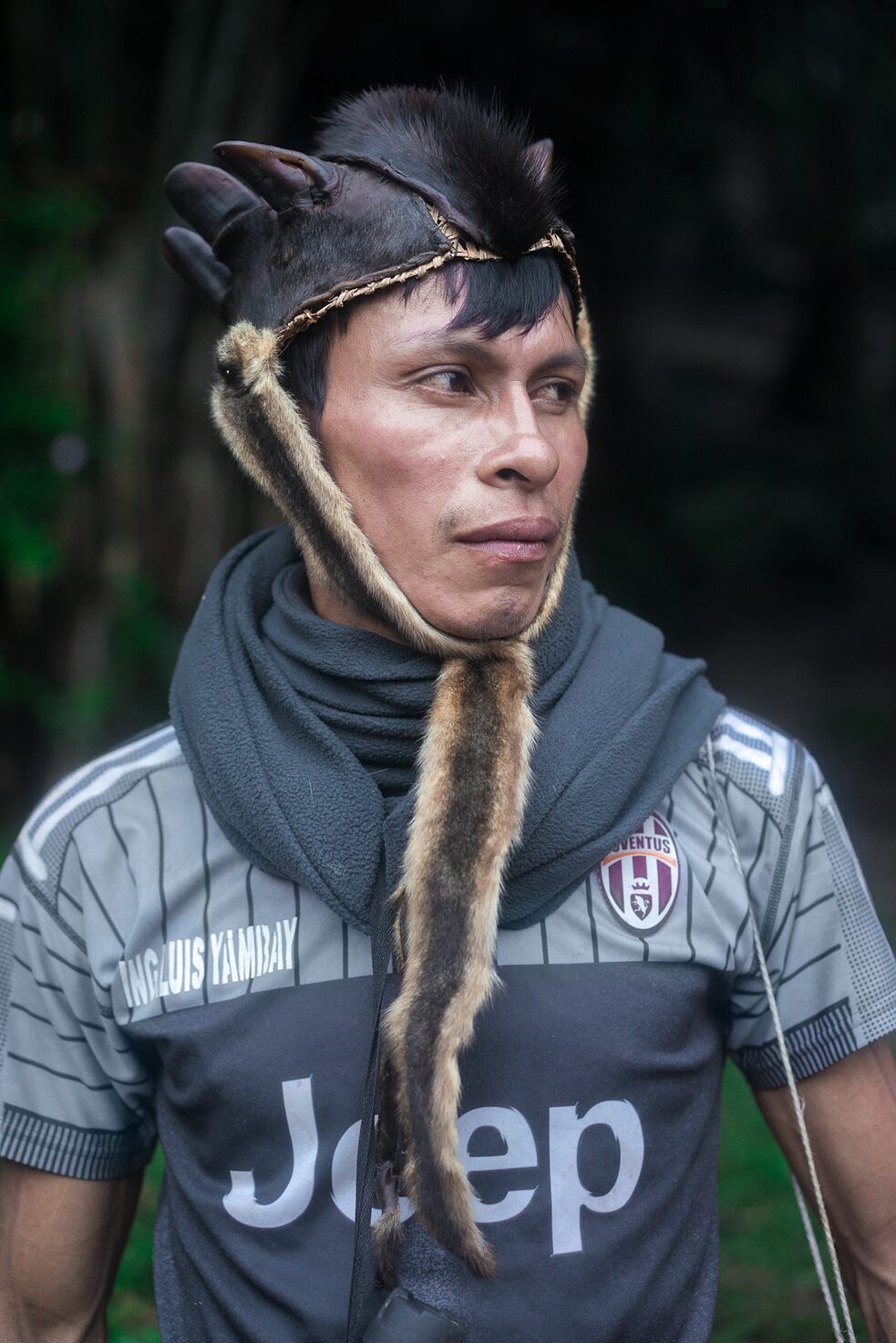 Portrait of Alejandro Gualinga wearing a hat made from a tapir at the start of the Uyantza Raymi festivities.