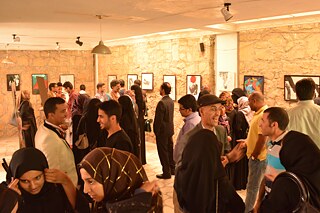 مؤسسة بيسمنت الثقافية، المعرض الفني "خطوط راقصة"، للرسامة هيا الحمومي، مايو للعام 2014