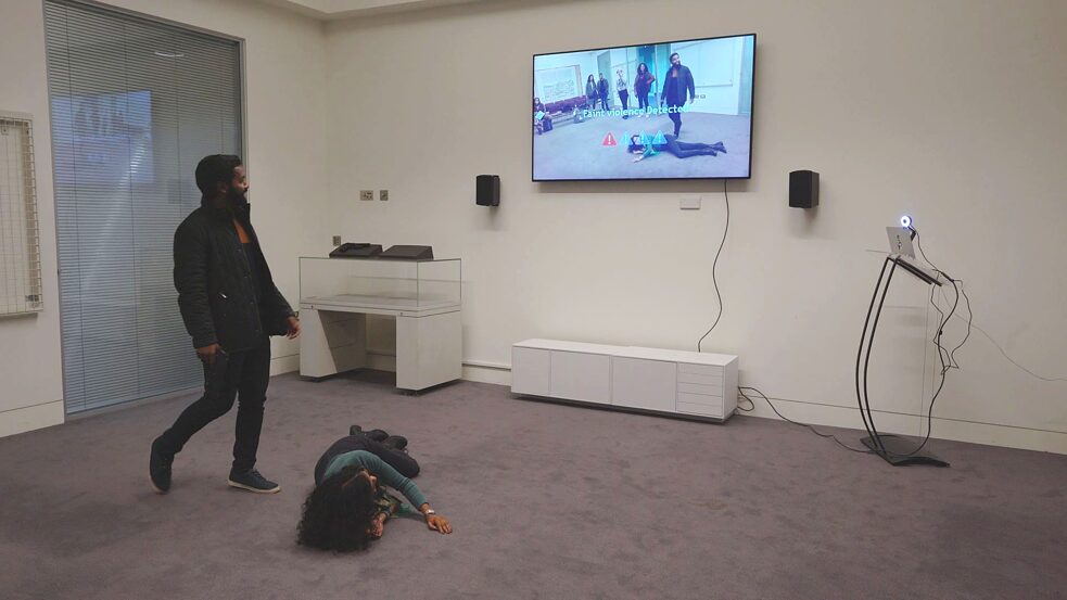 Participants take part in a staged "Is this violence?" session from Tomo Kihara