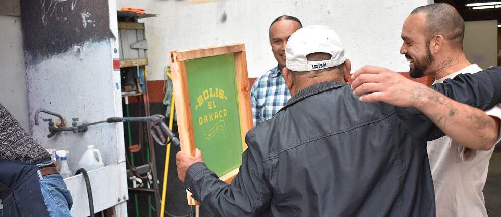 JornARTleros, a project designed by Joel, converted Self Help Graphics & Art into a design house for low wage workers focusing on Street Vendors and Day Laborers to transfer the screen-printing process and knowledge to these individuals. These marginalized entrepreneurs, upon completing the project left with a set of brand work apparel and their own personalized silkscreen. 