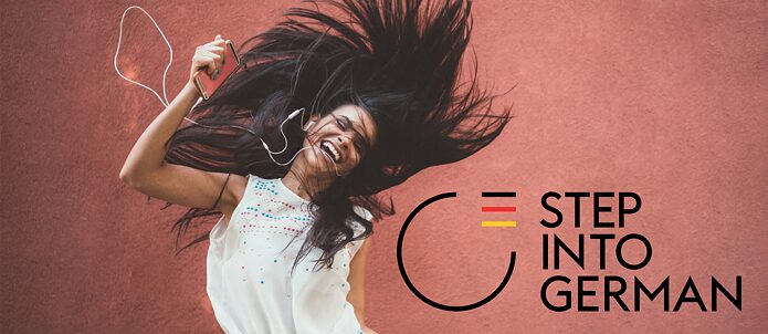 Women listening to music and shaking her hair