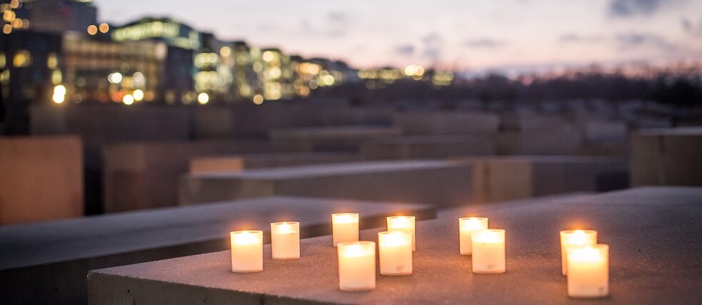 Field of stone pillars (stelea) with candles