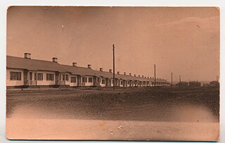 Wohnhäuser der AIK „Kusbass“, Typ „A“ („Wurst-Häuser“) im Bergwerk Kemerowo. Kemerowo. Architekt: J. van Lochem // 1920er Jahre