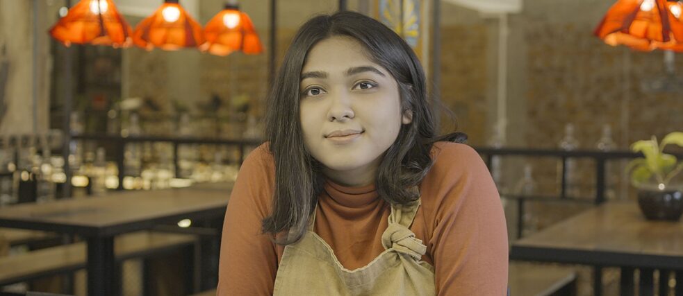 Cafe Mango Sameera hält inne, um sich einen Moment Zeit zu nehmen