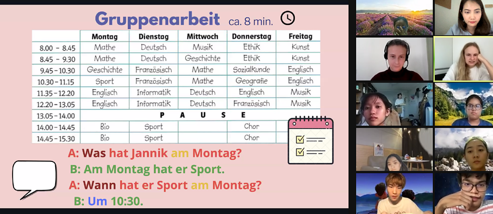 Students from an online course look at a table