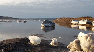 Arrival of summer: Leftovers of the winter ice on the Lena shores in Kyusyur village. 