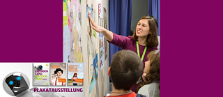   Teacher pointing to poster exhibition