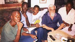 The late comic artists Henrique Abranches with 3 students.