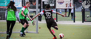teenagers playing football
