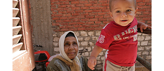 A grandmother with her grandson in Tizmant, Egypt 