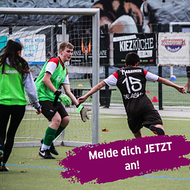teenagers playing football