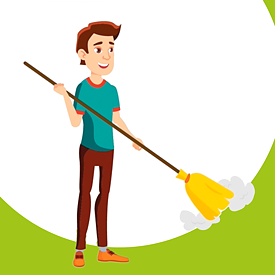 Ein Junge kehrt mit einem Besen den Boden.