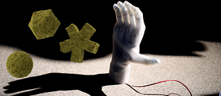 Electronic hand model trying to grasp floating moss objects in mid-air