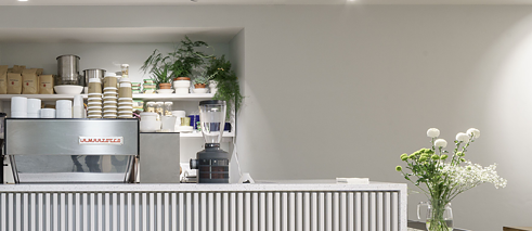 Photograph coffee machine and flowers