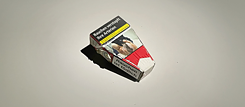 A pack of cigarettes shaped like a coffin