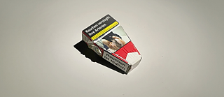 A pack of cigarettes shaped like a coffin ©  © Maximiliano Sinani / Melissa Morrigan  Pack of Cigarettes