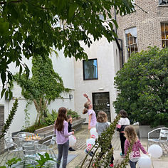Children playing in the courtyard at Goethe-Institut Irland in the sunshine