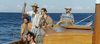 Picture of five persons on a boat