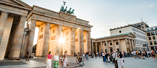 Sunrays shining through the Brandenburg Gate