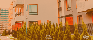 Man sieht eine typische Wohnsiedlung mit mehreren Gebäuden