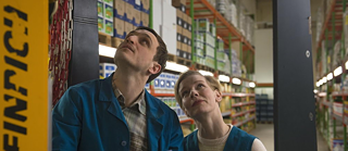 Banner mit Still von Film In den Gängen mit Sandra Hüller